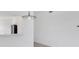 Open living space featuring a pass-through bar with pendant lighting at 9630 Club South Cir # 6303, Sarasota, FL 34238
