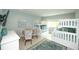 bedroom featuring bunk beds, a table, and seating at 102 77Th St, Holmes Beach, FL 34217
