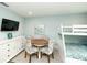 bedroom featuring bunk beds, a table, and seating at 102 77Th St, Holmes Beach, FL 34217