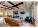 Community clubhouse featuring coffered ceilings, ample seating, and a large media screen at 11254 82Nd St E, Parrish, FL 34219