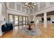 Welcoming lobby with high ceilings, elegant chandelier, and comfortable seating areas at 11254 82Nd St E, Parrish, FL 34219