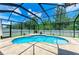 Enjoy this refreshing kidney-shaped pool in a screened lanai with brick paver deck at 11254 82Nd St E, Parrish, FL 34219