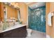 Stylish bathroom featuring modern fixtures, a glass-enclosed shower, and an elegant vanity with ample storage at 1182 Blue Shell Loop, Sarasota, FL 34240