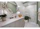 Elegant bathroom featuring tiled walls, a modern vanity, and a glass-enclosed shower at 1182 Blue Shell Loop, Sarasota, FL 34240