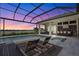 Resort style pool and hot tub with waterfront views and comfortable lounge chairs, ideal for relaxation and entertainment at 1182 Blue Shell Loop, Sarasota, FL 34240