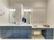 Stylish bathroom with double vanity, elegant cabinets, and a makeup area at 12175 Maple Ridge Dr, Parrish, FL 34219