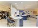 Spacious kitchen with breakfast bar, stainless steel appliances, and open floor plan at 12175 Maple Ridge Dr, Parrish, FL 34219
