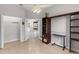 Bedroom featuring hardwood floors, a ceiling fan, and walk-in closet at 135 Tall Trees Ct, Sarasota, FL 34232