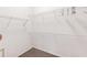 Walk-in closet with ample shelving for organized storage at 135 Tall Trees Ct, Sarasota, FL 34232