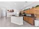 Spacious kitchen with stainless steel appliances and granite countertops at 135 Tall Trees Ct, Sarasota, FL 34232