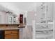 Kitchen counter and pantry in an open-concept floor plan at 135 Tall Trees Ct, Sarasota, FL 34232