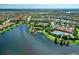 Resort-style community featuring a pool, tennis courts, and beautiful landscaping at 13710 Messina Loop # 201, Bradenton, FL 34211