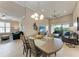 Open layout blends the dining and living spaces, enhanced by modern decor and comfortable seating at 13710 Messina Loop # 201, Bradenton, FL 34211