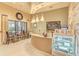 Interior shot of the lobby with a front desk, seating, and beverage display at 13710 Messina Loop # 201, Bradenton, FL 34211