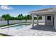 Inviting pool with paved patio and privacy fence, perfect for outdoor entertaining and relaxation in the sun at 14065 Paris Ln, Port Charlotte, FL 33981