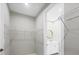 Spacious walk-in closet featuring shelving units and easy access to the adjacent bathroom at 14065 Paris Ln, Port Charlotte, FL 33981