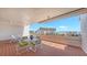 Enjoy outdoor dining on this spacious balcony with beautiful city views at 1465 Gulf Of Mexico Dr # 502, Longboat Key, FL 34228