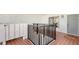 Inviting condo entrance with welcome mat, modern lighting, and gated access for added security at 1465 Gulf Of Mexico Dr # 502, Longboat Key, FL 34228