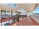 Exterior condo hallway with tile flooring and ample natural light offers an open and airy ambiance at 1465 Gulf Of Mexico Dr # 502, Longboat Key, FL 34228