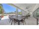 Expansive outdoor patio with ample seating, ceiling fans, and city views, perfect for entertaining guests at 1465 Gulf Of Mexico Dr # 502, Longboat Key, FL 34228