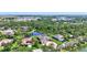Scenic aerial view of home highlighting the community's landscaping, ponds, and prime location at 15006 21St E Ave, Bradenton, FL 34212