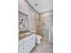 The bathroom features a shower and granite countertops at 15006 21St E Ave, Bradenton, FL 34212