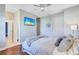 Bedroom featuring wood floors, neutral paint, and ceiling fan at 15006 21St E Ave, Bradenton, FL 34212