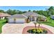 Beautiful, well-maintained home with a circular driveway and a three-car garage at 15006 21St E Ave, Bradenton, FL 34212