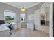 Home office featuring ample light, shelving, and workspace at 15006 21St E Ave, Bradenton, FL 34212