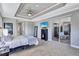 Spacious main bedroom with patio access and ensuite bath at 15006 21St E Ave, Bradenton, FL 34212