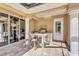 Outdoor kitchen featuring granite countertop, stainless steel grill and seating at 15006 21St E Ave, Bradenton, FL 34212