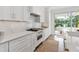 Well-equipped kitchen with stainless steel appliances and outdoor access at 1642 Arlington St, Sarasota, FL 34239