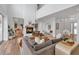 Bright, spacious living room featuring a fireplace, hardwood floors, and elegant decor at 1642 Arlington St, Sarasota, FL 34239