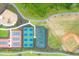 Overhead shot of community park with tennis courts, baseball field, playground, and walking trails at 17122 Ranchside Pl, Bradenton, FL 34211