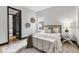 Comfortable bedroom with neutral decor, providing a peaceful and inviting space at 17122 Ranchside Pl, Bradenton, FL 34211