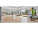Mirrored exercise studio with wood flooring and fitness equipment at Star Farms at 17122 Ranchside Pl, Bradenton, FL 34211