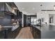 Well-appointed kitchen with stainless steel appliances, custom cabinetry, and a center island, perfect for cooking at 17122 Ranchside Pl, Bradenton, FL 34211