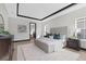 Spacious main bedroom boasts a plush rug, stylish furniture, and neutral tones for a calming retreat at 17122 Ranchside Pl, Bradenton, FL 34211