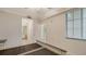 Bedroom with carpet and bathroom doorway at 17704 Gawthrop Dr # 303, Lakewood Ranch, FL 34211