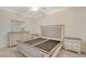 Bedroom with matching bedroom set, ceiling fan, and carpet at 17704 Gawthrop Dr # 303, Lakewood Ranch, FL 34211