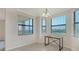 Bright dining area featuring large windows and a table at 17704 Gawthrop Dr # 303, Lakewood Ranch, FL 34211