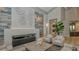 Modern clubhouse lounge with fireplace, plush seating and attractive decor at 17704 Gawthrop Dr # 303, Lakewood Ranch, FL 34211
