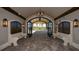 Elegant lobby with grand wrought iron gates and seating, perfect for relaxing at 17704 Gawthrop Dr # 303, Lakewood Ranch, FL 34211