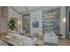 Stylish lobby featuring modern furniture, accent wall, and bright, airy space at 17704 Gawthrop Dr # 303, Lakewood Ranch, FL 34211