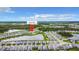 Aerial view highlighting the community amenities and surrounding landscape at 18510 Midsummer Pl, Venice, FL 34293