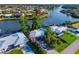 Waterfront homes feature boat docks along a tranquil canal, showcasing an idyllic coastal living community at 1921 Fairview Dr, Englewood, FL 34223
