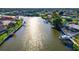 Beautiful aerial view shows the waterway, docks and neighborhood homes at 1921 Fairview Dr, Englewood, FL 34223
