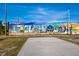 Vibrant 'Greetings From Englewood' mural showcasing the local charm and community spirit at 1921 Fairview Dr, Englewood, FL 34223