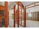 Open room featuring exposed walls, ceiling fan, and natural light at 1921 Fairview Dr, Englewood, FL 34223