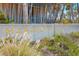 Manasota Beach sign surrounded by lush greenery at 1921 Fairview Dr, Englewood, FL 34223